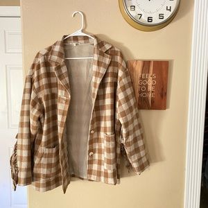 Plaid frill jacket. Only used once or twice. Size medium.